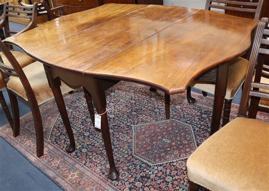 A butterfly top mahogany pad foot table Length 135cm